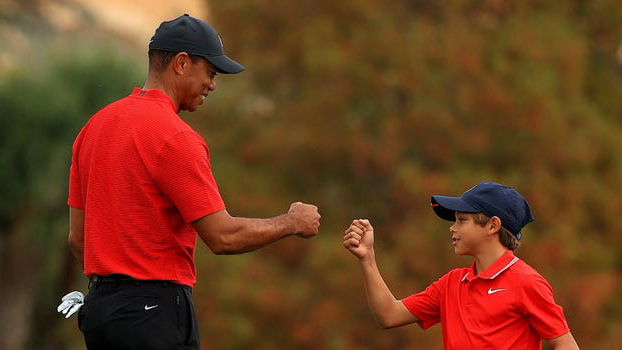 Tiger Woods goes all-in caddying for Charlie after latest swing clip goes viral 